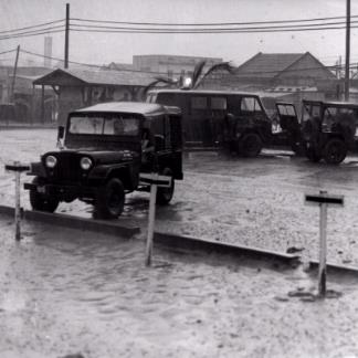 Jeeps in the rain at Qui Nhon.