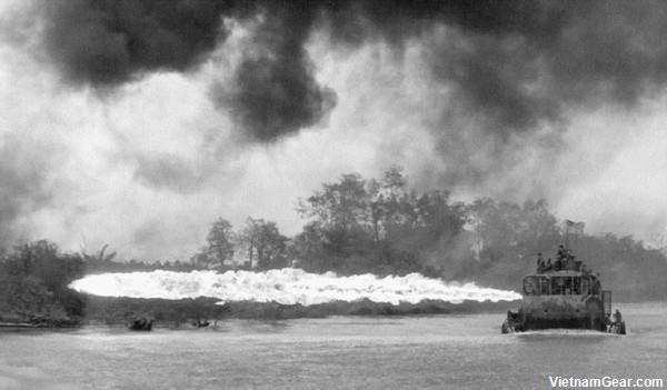 An experimental flame throwing ATC torches the riverbank near Dong Tam