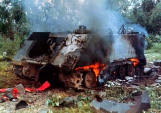 M-113 Armored Personnel Carrier (APC) destroyed by an enemy rocket propelled grenade (RPG).