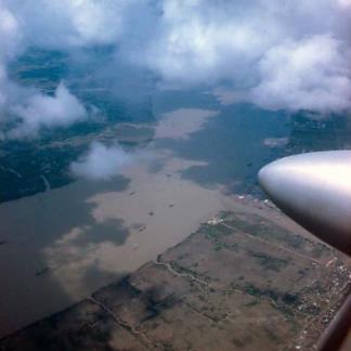 Flying over the Mekong Delta in a Vietnam Airlines DC-3.