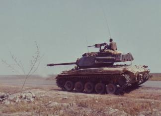 An M-41 Walker Bulldog tank from the 5th ARVN Cavalry opens fire on an enemy position in Bien Hoa (III Corps).
