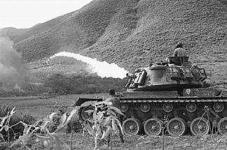 A Marine Corps M67 Flamethrower tank (M48 tank equipped with a flamethrower) in action in I Corps.