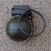 The V40 mini fragmentation grenade was produced by Nederlandse Wapen en Munitiefabriek of Holland and was named the "Hooch Popper" by SOG teams.