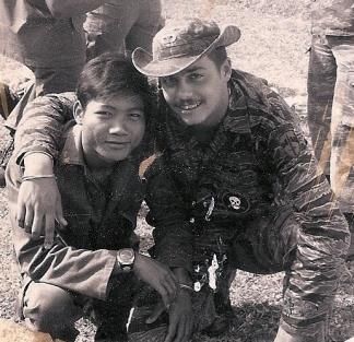 Special Mission Force member Clay Curtis with his Rhade Montagnard interpreter Peo.