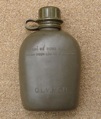 The ARVN 1-quart canteen was made from plastic and featured a screw cap with an attaching strap.