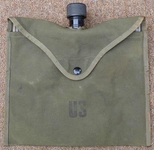A variant of the standard 2nd pattern cover, this canvas version features a snap fastener rather than Velcro and no pocket for water purification tablets.