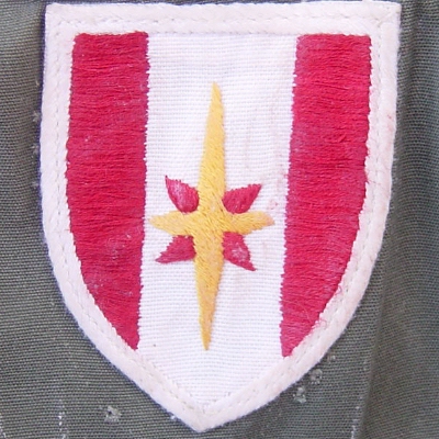 Locally made shoulder sleeve insiginia of the 44th Medical Brigade.
