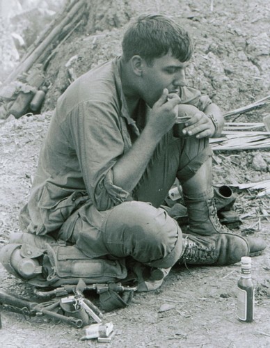A solider of the 47th Infantry (Mechanised), 9th Infantry Division eats his C-ration directly from the can.