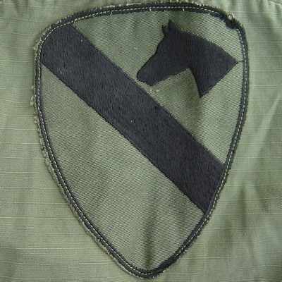 Locally made subdued 1st Cavalry Division (Airmobile) shoulder sleeve insignia.