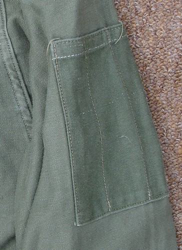 A pen pocket has been added to the left sleeve of this early model Utility Shirt.