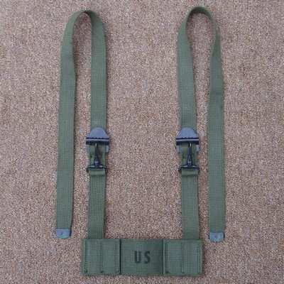 M1956 field pack adapter strap assembly.