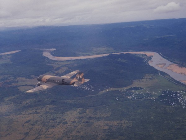 A USAF C-47 releases psychological warfare leaflets near Nha Trang in South Vietnam.