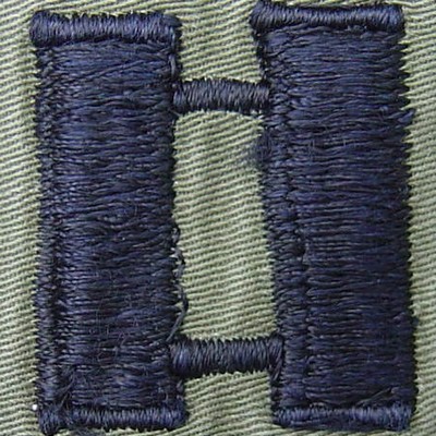 US Army Captain collar insignia.