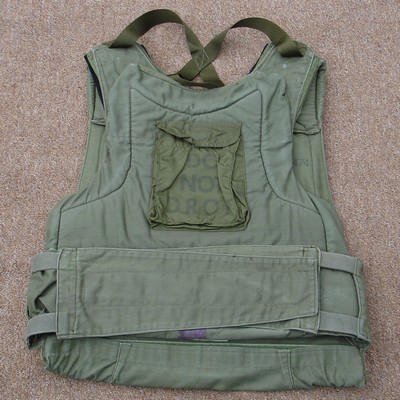 An aircew armor vest featuring a home-made quick release system.