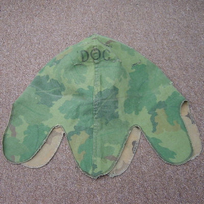 This early Navy issued Mitchell pattern helmet cover has 'Doc' written on it and is the actual cover that appeared on page 67 of Kevin Lyles' book US Uniforms In Colour Photographs.
