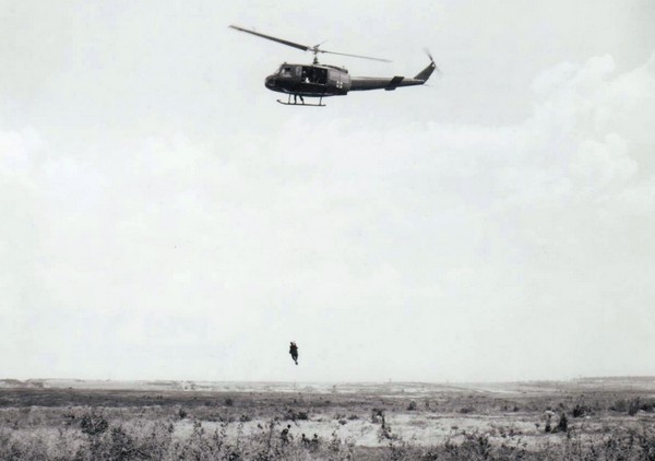 A Dustoff chopper extracts a wounded soldier as part of an exercise at the 199th Infantry Brigade training center near Bien Hoa (III Corps).