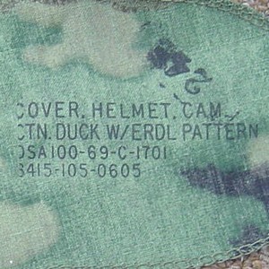 Nomenclature stamp from the underside of a 1969 contract dated ERDL helmet cover.