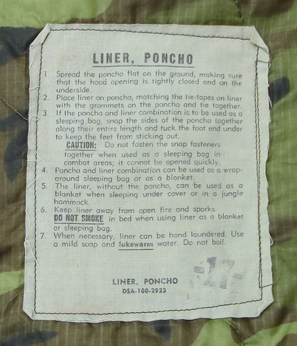 Label from a 1966 contract dated ERDL camouflage poncho liner.
