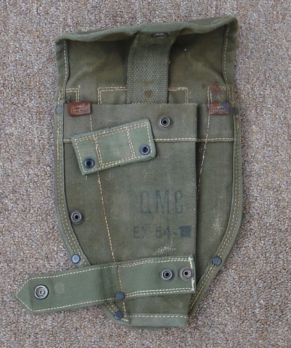 The experimental EX-54 shovel carrier had two snap fasteners on the bayonet securing strap so that it could accommodate two types of scabbard.