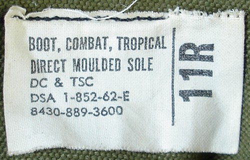 Nomenclature and size label from the inside tongue of a pair of 1962 DMS jungle boots.