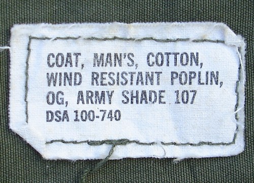 The 2nd pattern Tropical Combat Jacket identification label displayed the nomenclature and contract number.