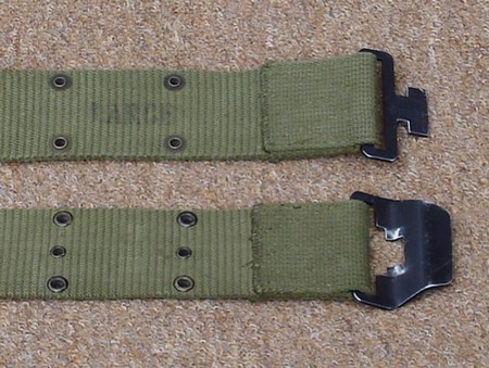 The waist belt issued with the P64 Lightweight Rucksack had a quick release T-slot buckle.