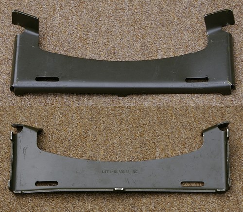 The first version of the Lightweight Rucksack cargo shelf featured two cargo strap slots.