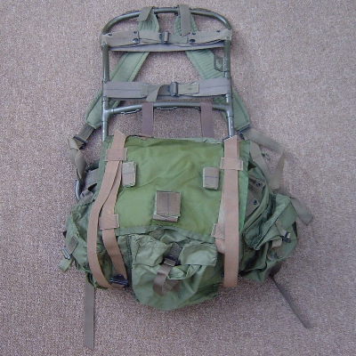 An M1967 sleeping gear carrier has been used to replace the pack flap of this  1968 model Lightweight Rucksack!