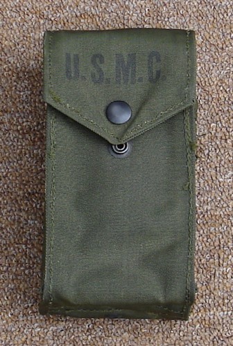 The nylon XM1964 USMC M-14V pouch had a snap fastener closure.