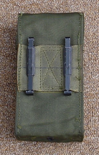 The slide keepers on the back of M-14V pouch were used to attach it to the equipment belt.