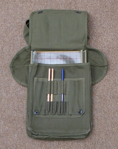 The M1938 Dispatch case had several slots for writing instruments and also boasted a transparent plastic insert with gridlines to aid the reading of maps.