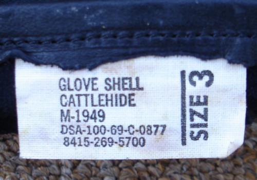 Nomenclature and contract label in a M1949 Glove Shell.