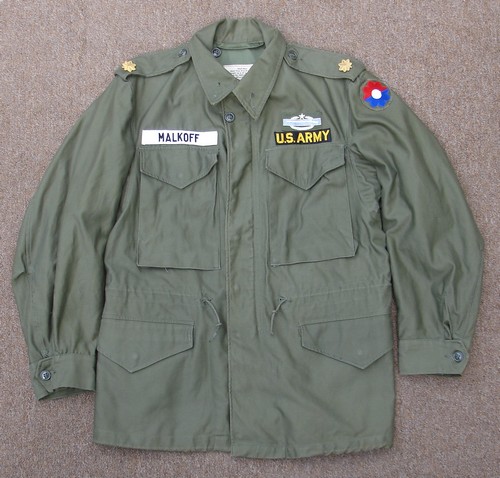 This M1951 Field Coat belonged to a Major in the 9th Infantry Division based around the Mekong Delta.