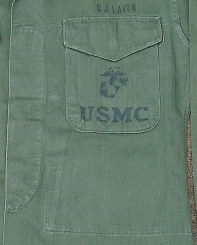 The Marine Corps Eagle, Globe and Anchor (EGA) insignia was stenciled on the left patch pocket of the P53 Utility Shirt.