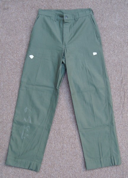 The Marine Corps P56 trousers were identical to the 1953 design, but were made from cotton sateen rather than HBT.