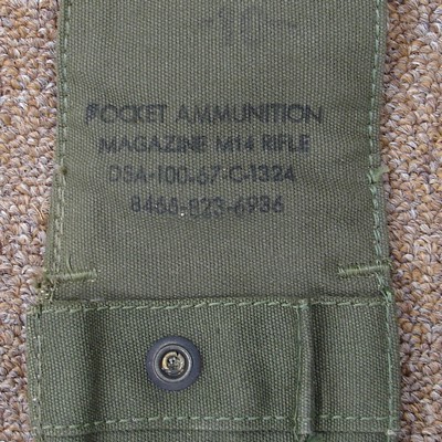 Nomenclature stamp inside the flap of a 1967 dated ‘long’ M1961 ammunition pocket.