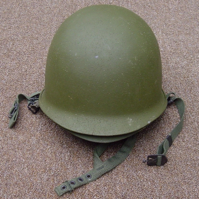 The steel M1 helmet was coated in an olive green paint that contained silica sand.