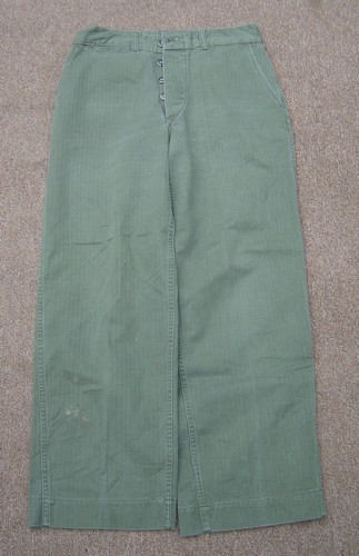 The Marine Corps P1953 trousers were made from HBT and  had a button fly and two front pockets.