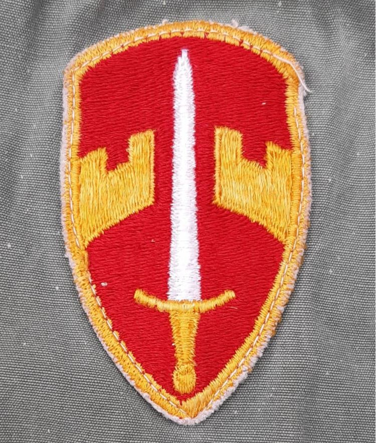 An early MACV color insignia with a raw / cut edge.