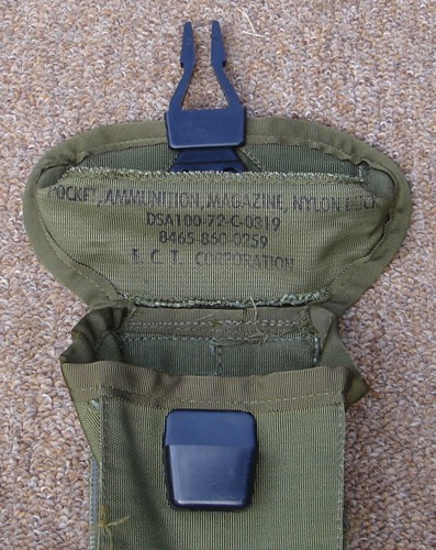 Nomenclature and contract stamp in the M1967 USMC M14 ammunition pocket.