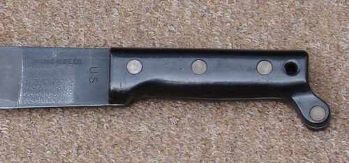 The M1942 Machete feature a riveted two-piece plastic handle.