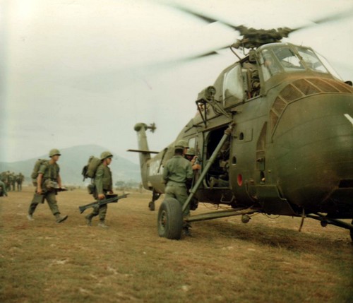 Members of the 1st Battalion 3rd Marines board a CH-34 Choctaw helicopter to be flown to position held by the 3rd Battalion 9th Marines.