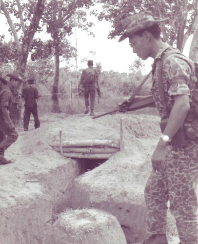 Vietnamese Strike Forces discover a Viet Cong dugout in the Ap Suoi rubber plantation in war zone “D”, north of Ben Cat (III Corps).