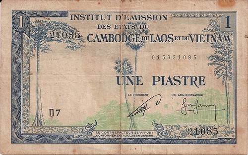 Front of a 1-Piastre banknote issued by the Institut d'Emission des Etats du Cambodge, du Laos et du Vietnam.