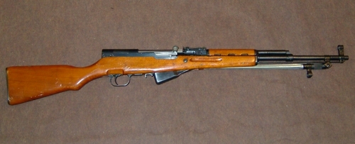 Chinese Type 56 SKS Carbine featured a spike-shaped folding bayonet attached to the underside of the barrel.