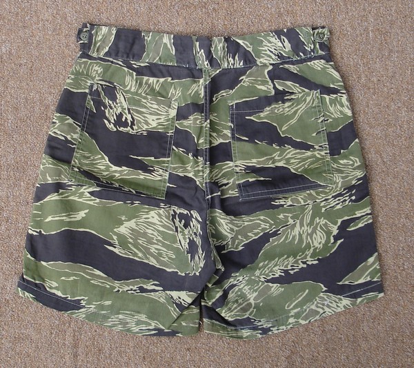 Made from lightweight cotton poplin, these JWD tiger stripe shorts have two hip patch pockets.