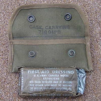 This M15 sight carrying case was used by a Marine to carry a field dressing in Vietnam.
