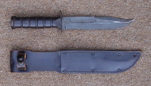 Utica made Ka-Bar knife with a dyed black handle and sheath