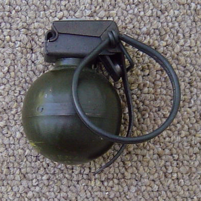 The V40 mini fragmentation grenade was produced by Nederlandse Wapen en Munitiefabriek of Holland and was named the "Hooch Popper" by SOG teams.