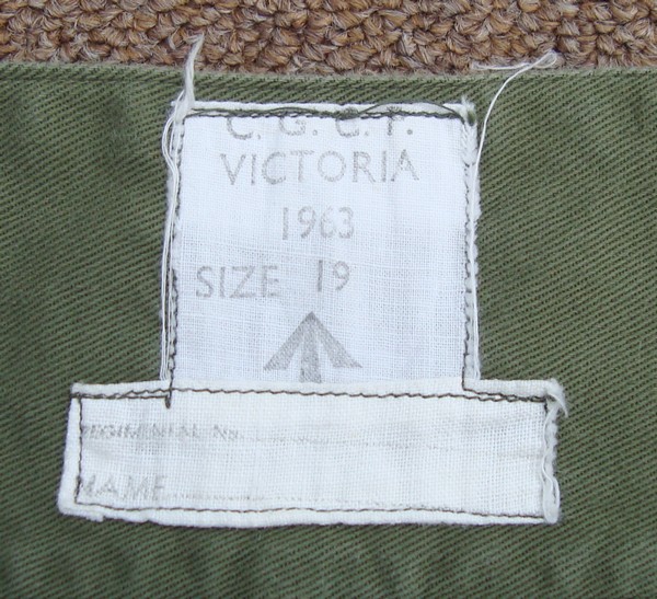 1st pattern Australian Jungle Green Trousers label with size, date and manufacturer.